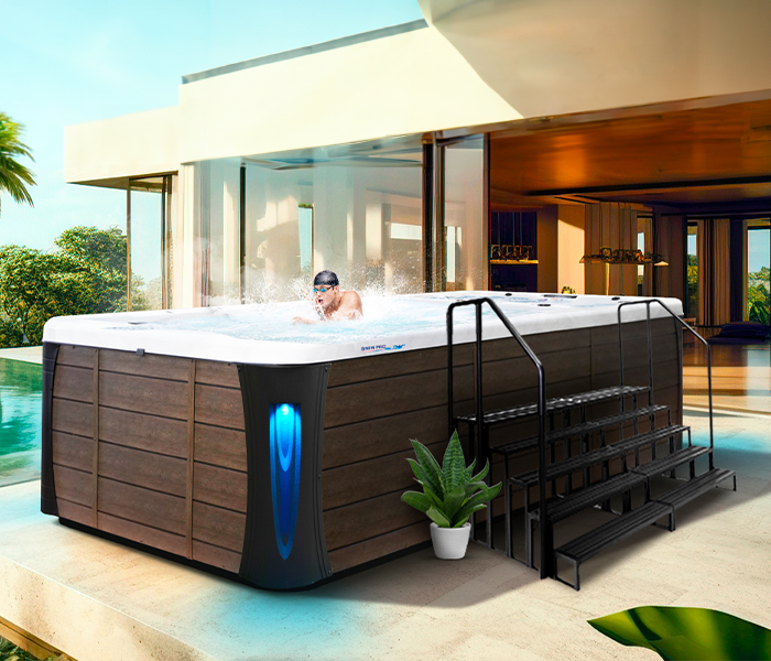 Calspas hot tub being used in a family setting - Bohemia